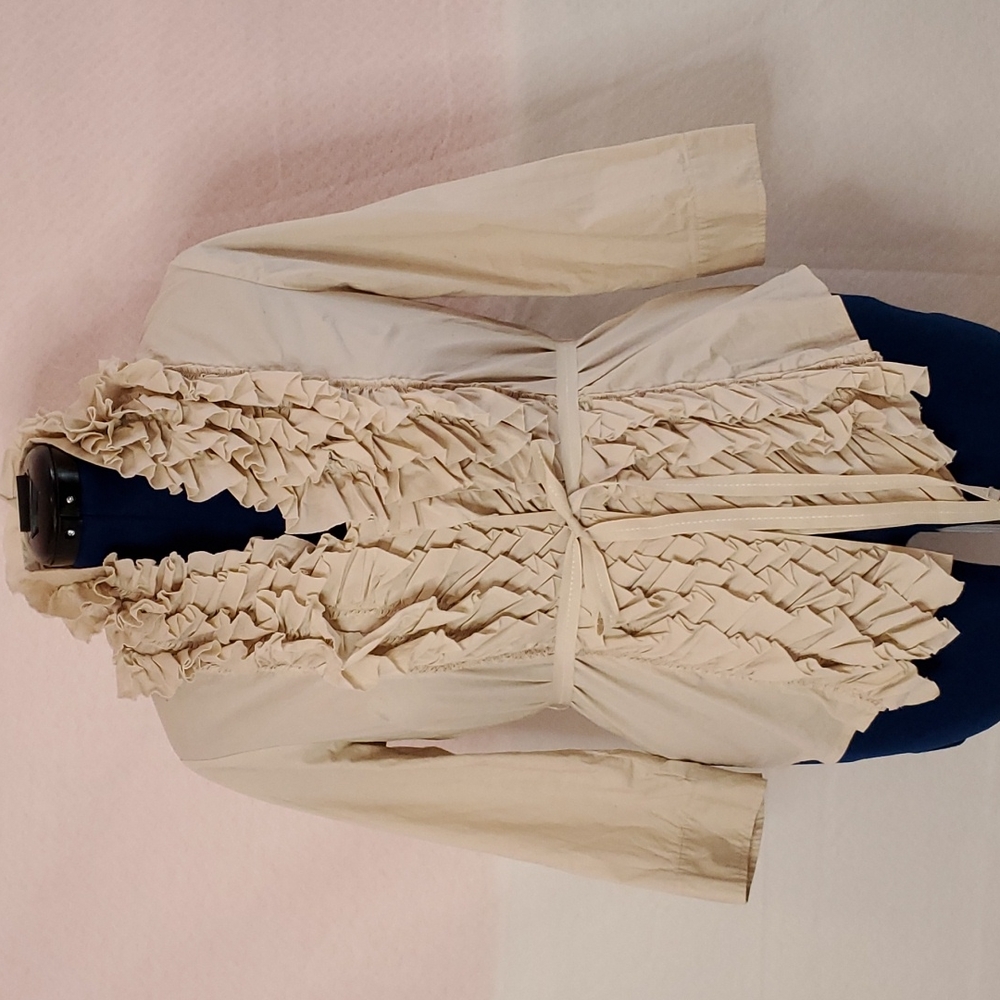 Women beige ruffle neck and front blouse.
